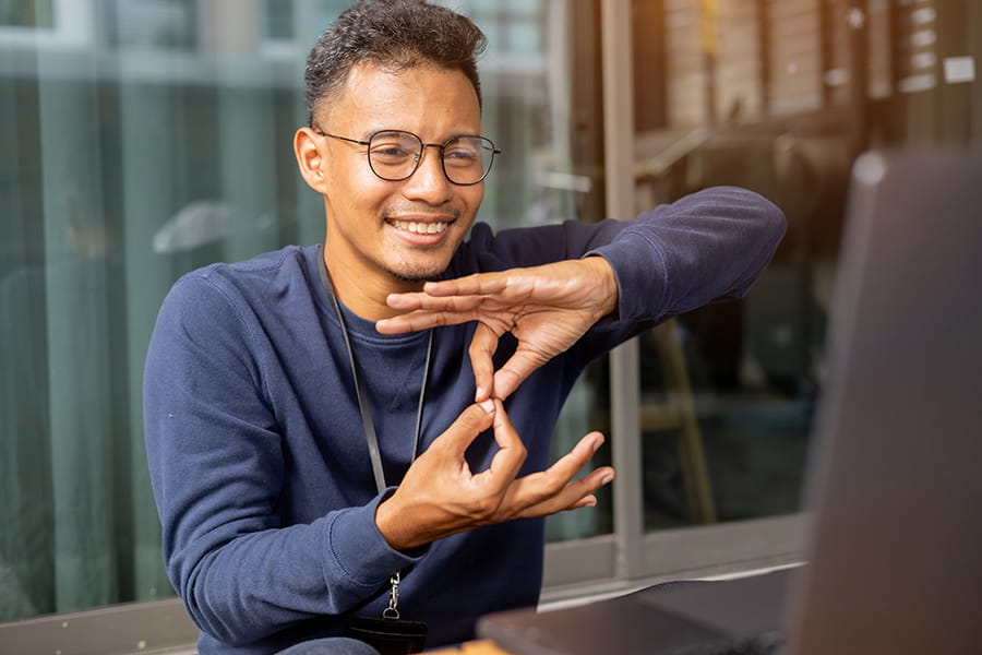 SJC Student practicing their sign language