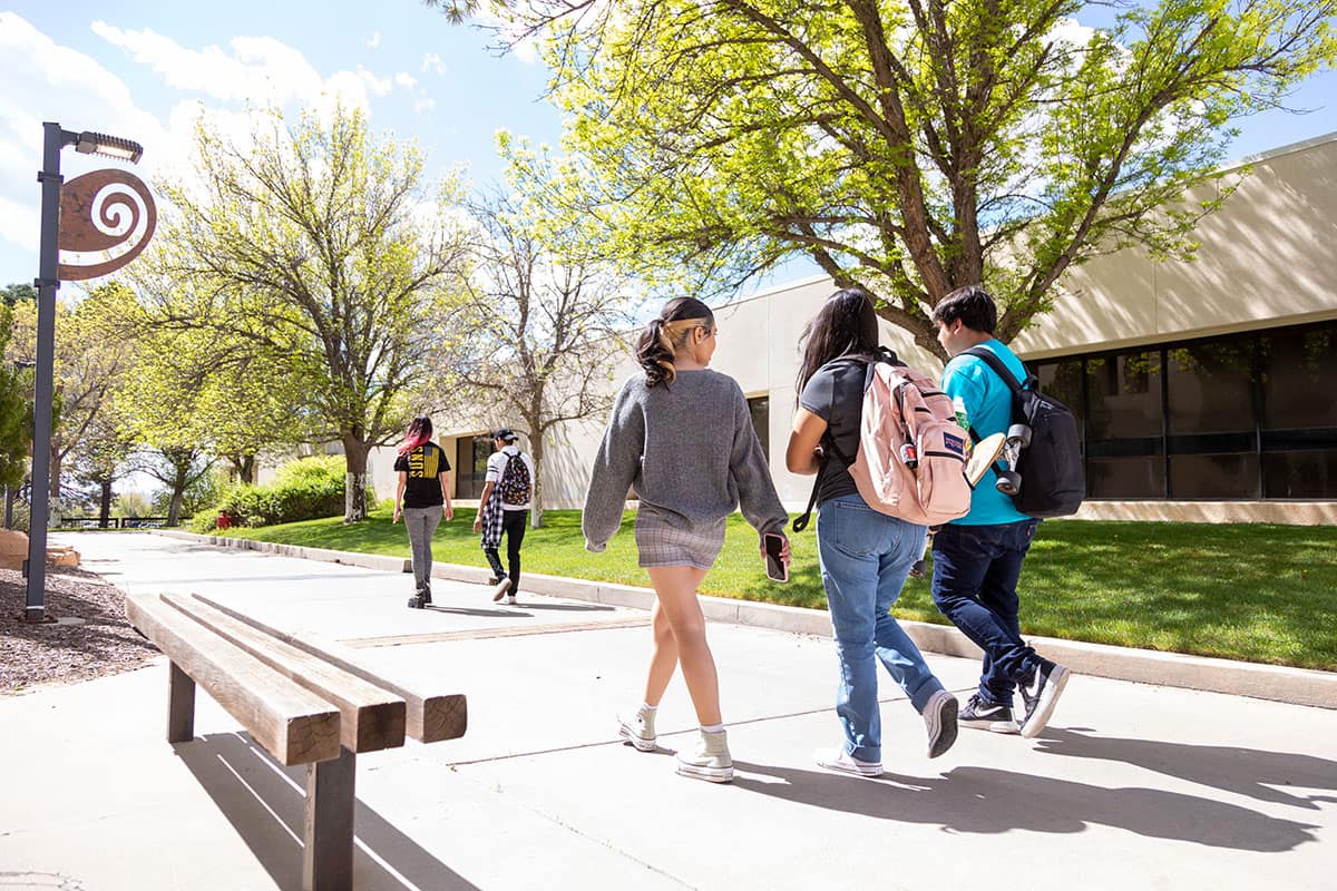 SJC Students walking on main campus during spring.