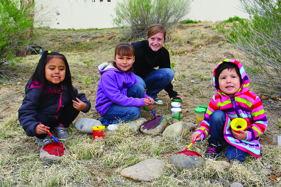 three small students with instructor in the CFDC program at SJC