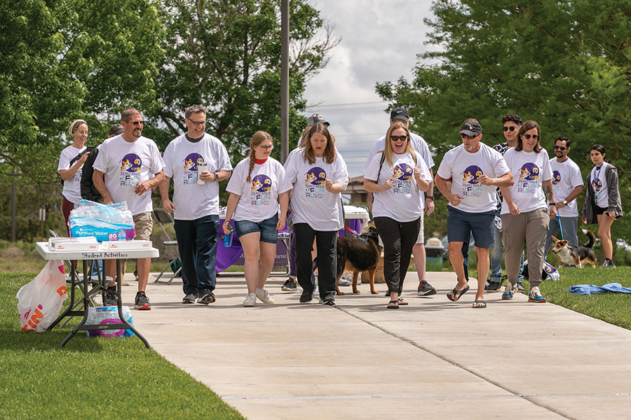 Group of individual on the SJC Campus doing the Zero Mile Fun Run