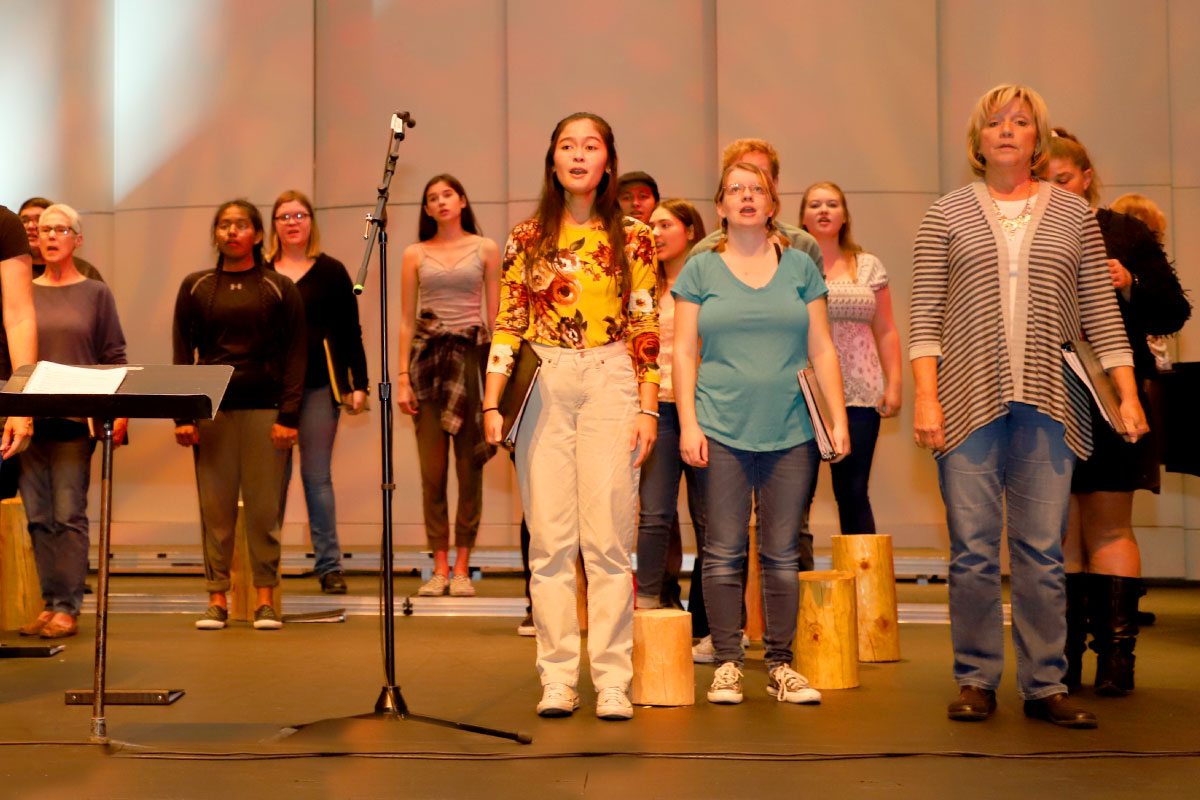 Group of students standing and singing