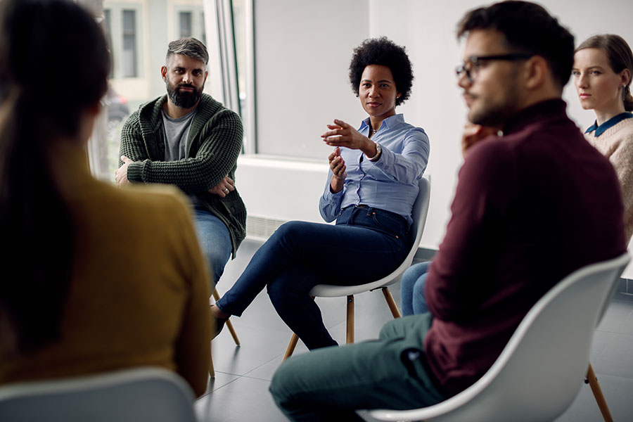 Students in a circle having conversation