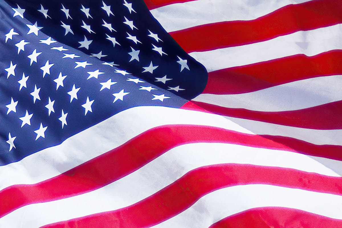 close up american flag rolling in the wind